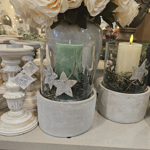 Cement Hurricane with Sage Candle and Christmas greenery