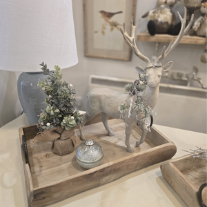 Wooden tray with stag Christmas tree and bauble candle